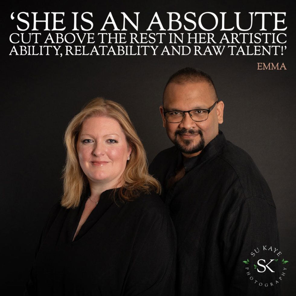 A woman and a man standing side-by-side, both smiling at the camera, with a testimonial about the woman's artistry displayed above their heads.