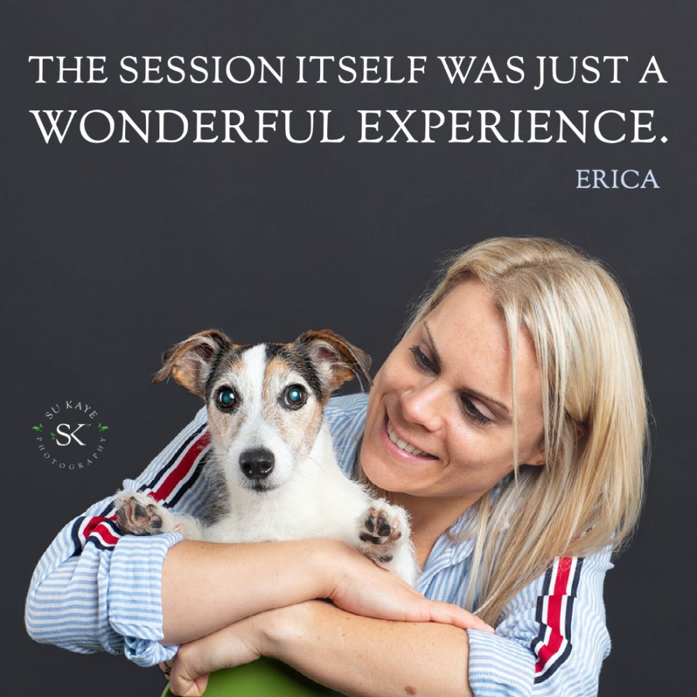 Woman smiling and holding a jack russell terrier, with a testimonial text about a positive experience overlaying the image.